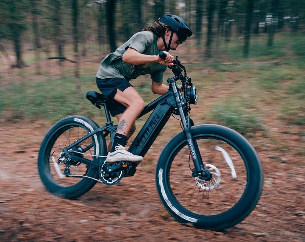 Vitilan Ebike riding through the autumn forest