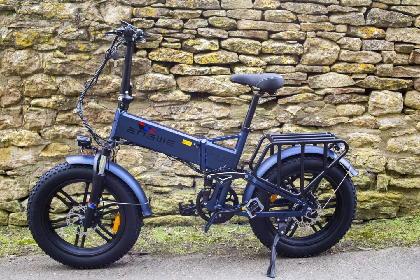 Engwe Ebike on the street near stone wall
