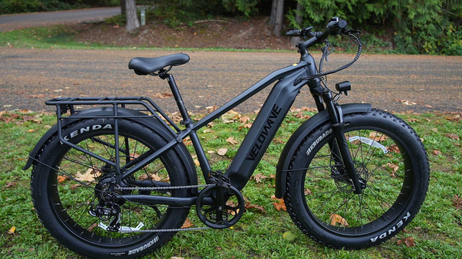 Velowave Electric Bike women riding in the street