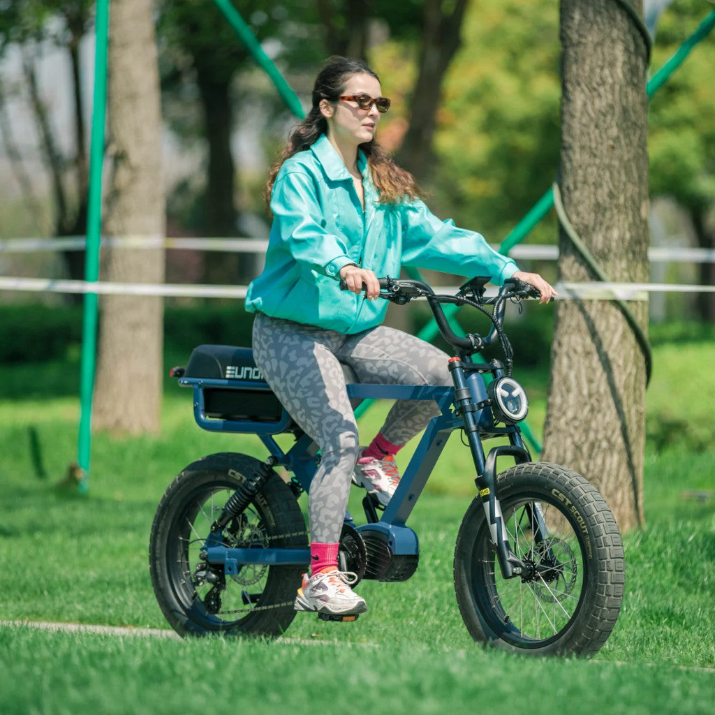 Eunorau Flash E-Bike women riding it in the park